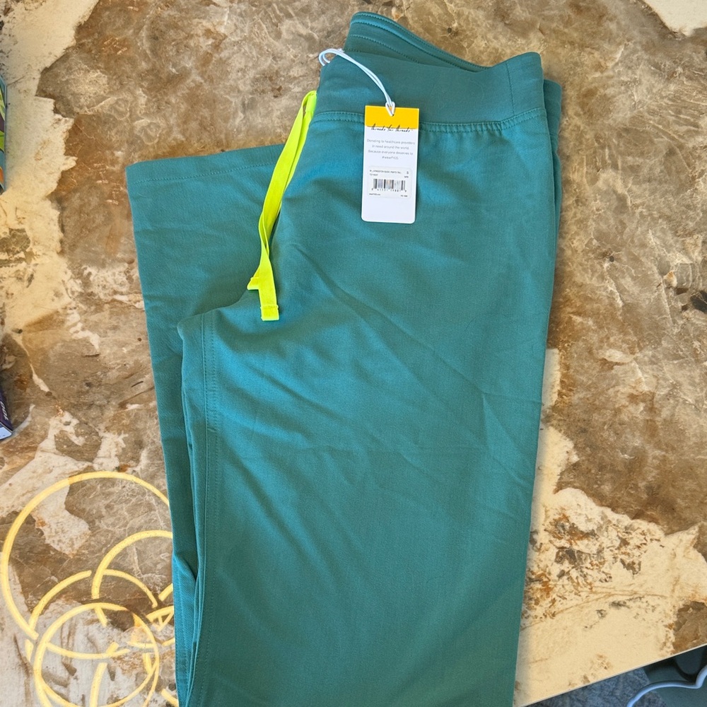 Figs Women's Boot Cut Scrub Pants in Teal with Neon Yellow Drawstring